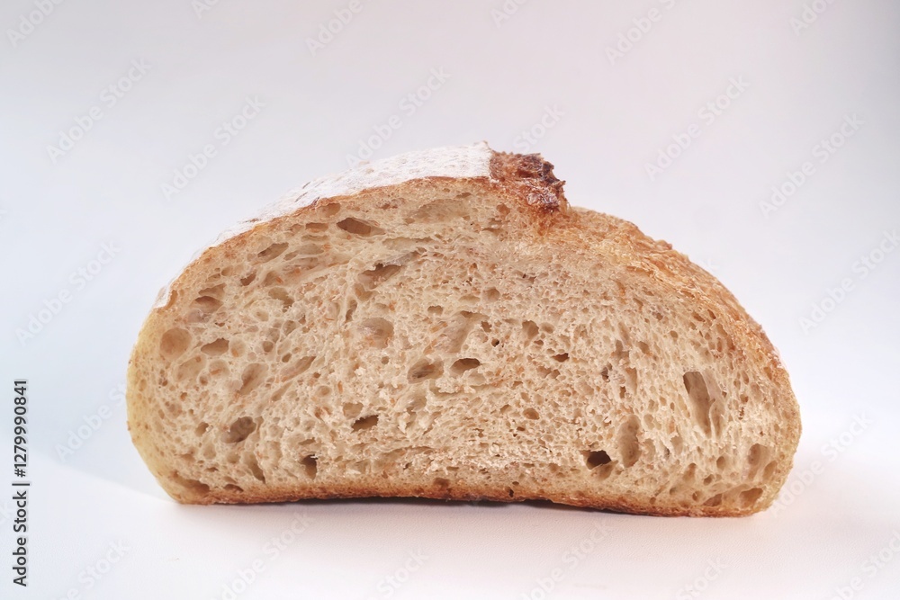 Country loaf sourdough bread on woodden table. Fresh fragrant bread on the table. Food concept. Healthy Food.
Country loaf sourdough bread on woodden table. Fresh fragrant bread on the table. Food concept. Healthy Food.
