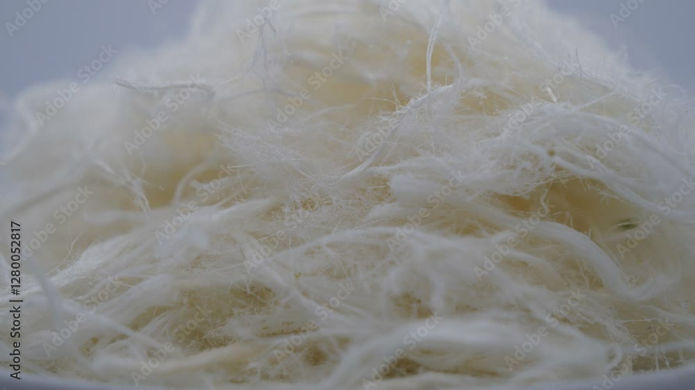 A close up shot of Turkish pişmaniye dessert. A close up shot of Turkish pişmaniye dessert.