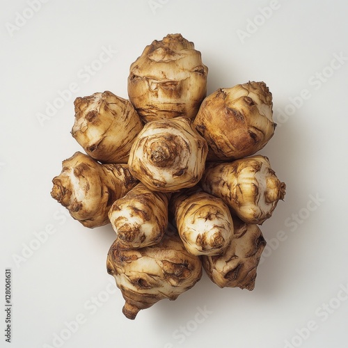 Jerusalem artichoke roots displayed in a circular pattern on white background