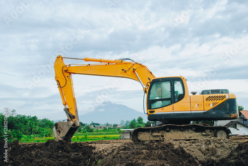Excavator is building a road at a construction site