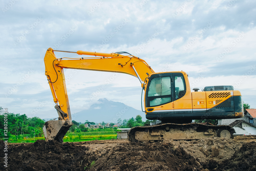 Obraz premium Excavator is building a road at a construction site