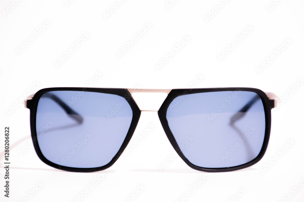 Sunglasses with black frame and blue glasses. Sun glasses. Modern blue sunglasses on white background Sunglasses with black frame and blue glasses. Sun glasses. Modern blue sunglasses on white background