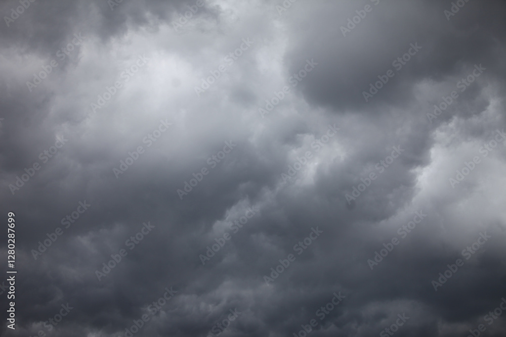Dramatic Sky: A captivating image of a foreboding sky blanketed with dark, ominous clouds, hinting at the impending atmospheric changes. Dramatic Sky: A captivating image of a foreboding sky blanketed with dark, ominous clouds, hinting at the impending atmospheric changes.