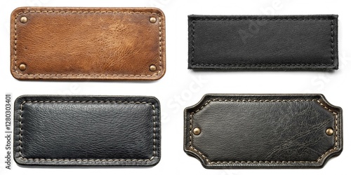 Four leather tags with different colors and designs. The tags are black, brown, and tan. The tan tag is the most prominent, and the black tag is the smallest