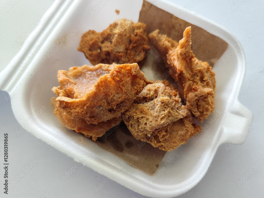 Tahu walik. Tahu walik traditional Indonesian food. Tahu walik traditional Indonesian food, in a styrofoam box. Tahu walik. Tahu walik traditional Indonesian food. Tahu walik traditional Indonesian food, in a styrofoam box.