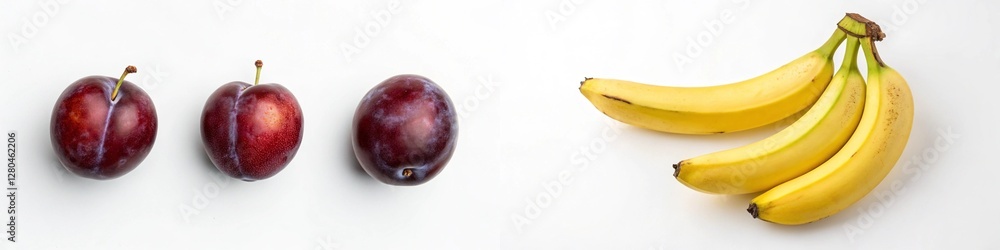 Obraz premium Three plums and a bunch of bananas arranged artistically on a white background.