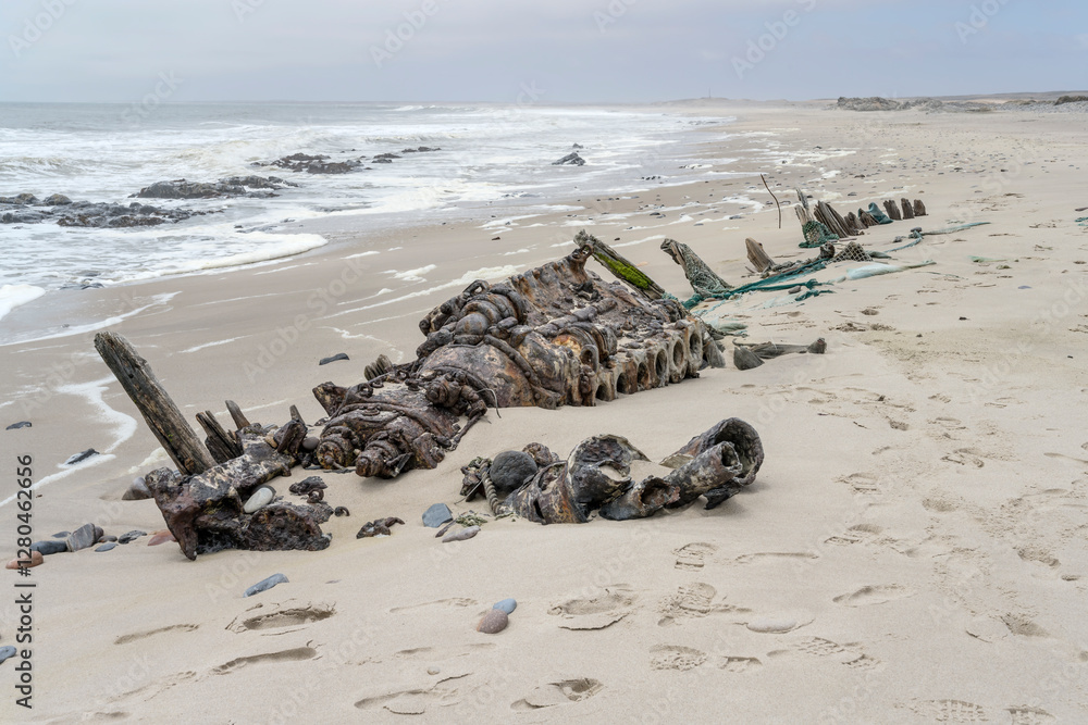 remains of sunken ship on beach at Ocean shore, South West Seal shipwreck, Skeleton coast, Namibia