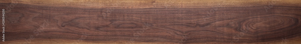 Walnut wood texture. Super long walnut planks texture background.Texture element Walnut wood texture. Super long walnut planks texture background.Texture element