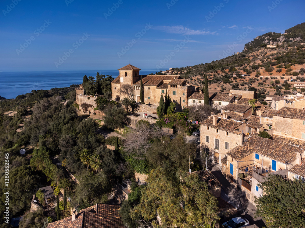 parish church of San Juan Bautista and village, 14th century, Deià, Natural area of the Serra de Tramuntana., Majorca, Balearic Islands, Spain parish church of San Juan Bautista and village, 14th century, Deià, Natural area of the Serra de Tramuntana., Majorca, Balearic Islands, Spain