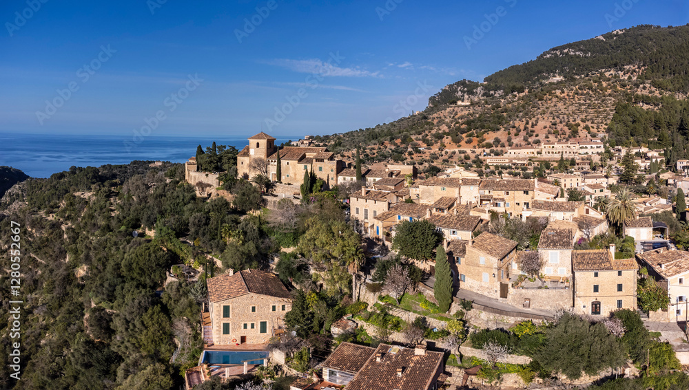 parish church of San Juan Bautista and village, 14th century, Deià, Natural area of the Serra de Tramuntana., Majorca, Balearic Islands, Spain parish church of San Juan Bautista and village, 14th century, Deià, Natural area of the Serra de Tramuntana., Majorca, Balearic Islands, Spain