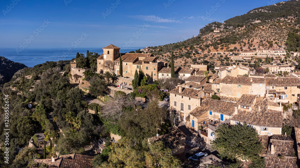 parish church of San Juan Bautista and village, 14th century, Deià, Natural area of the Serra de Tramuntana., Majorca, Balearic Islands, Spain parish church of San Juan Bautista and village, 14th century, Deià, Natural area of the Serra de Tramuntana., Majorca, Balearic Islands, Spain