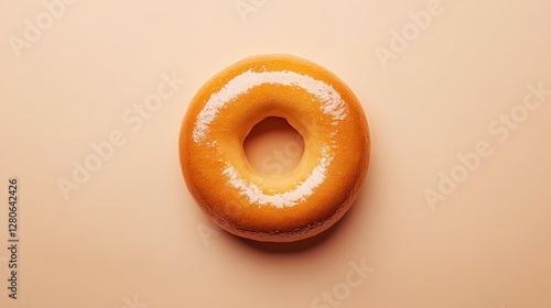 Glazed donut on a peach background.