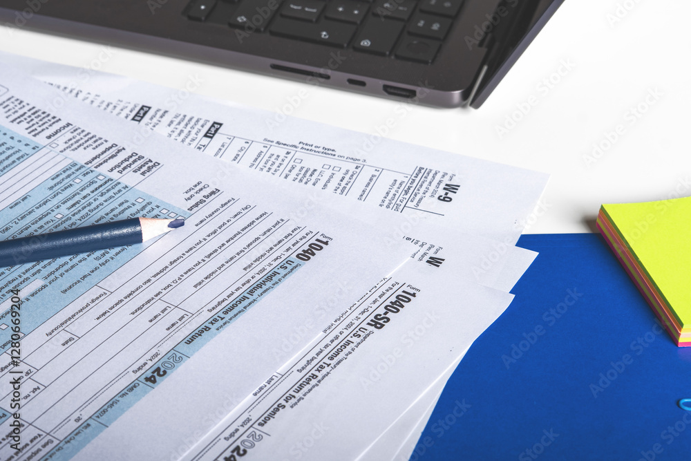 Accountant preparing tax form 1040 for tax season 2025 Accountant preparing tax form 1040 for tax season 2025