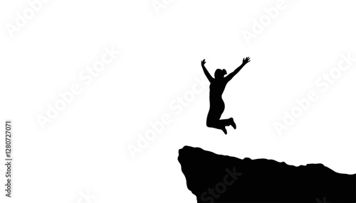 Silhouette of a person jumping joyfully off a cliff