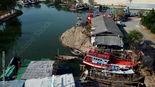 Wallpaper Mural Low and Slow Drone Flight Over Southeast Asian Fishing Boats and Coastal Community Torontodigital.ca