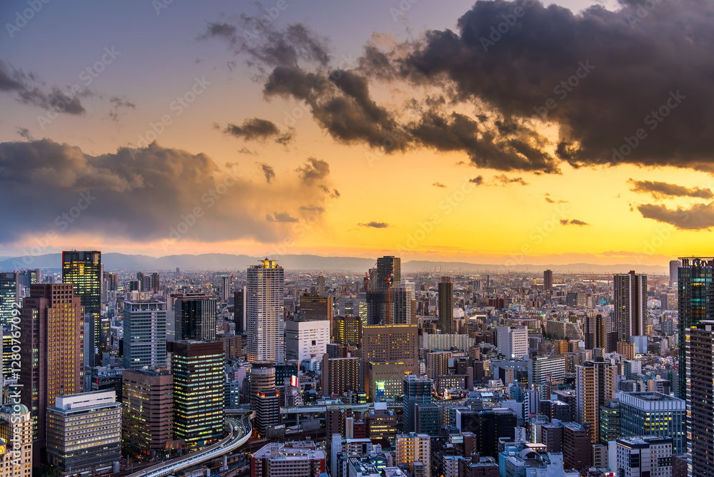Obraz premium Osaka city Japan skyline building Umeda district cityscape at sunset.