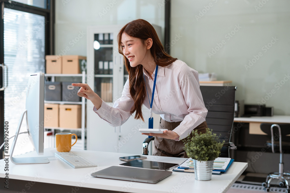 Women are using calculators to calculate office income. Women are using calculators to calculate office income.
