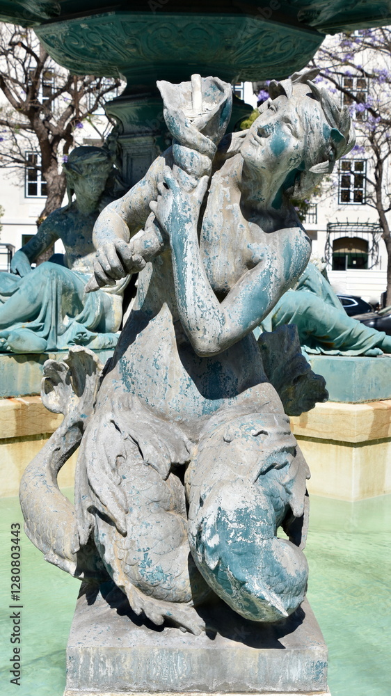 Φωτογραφία Mermaid Detail in South Fountain of Rossio Square, Lisbon, Portugal