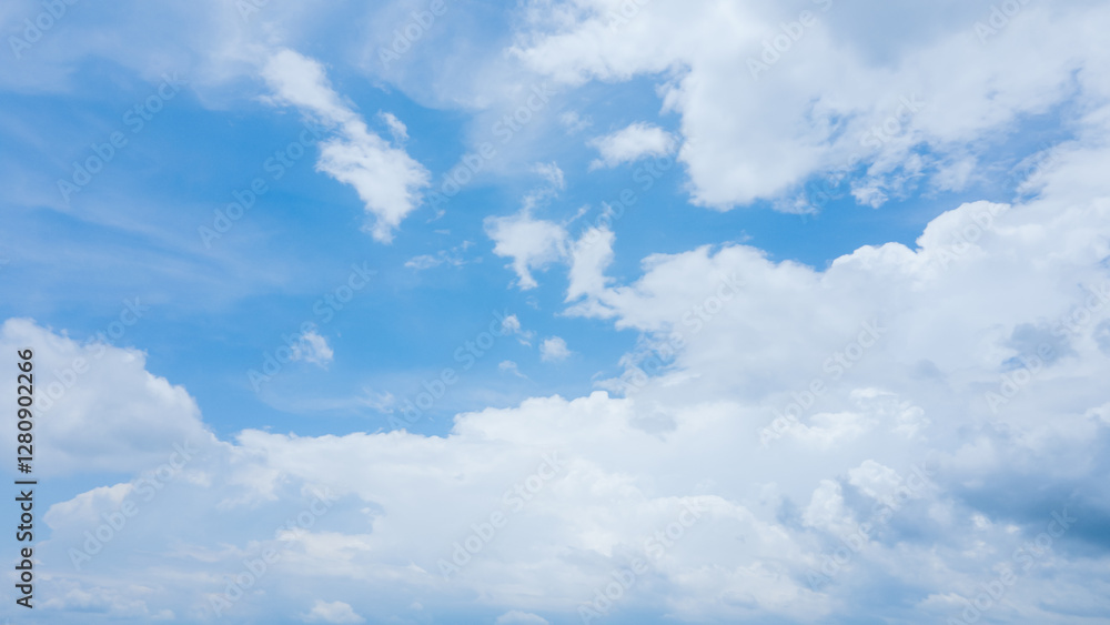 Fototapeta premium Tranquil Sky View with White Clouds and Blue Horizon