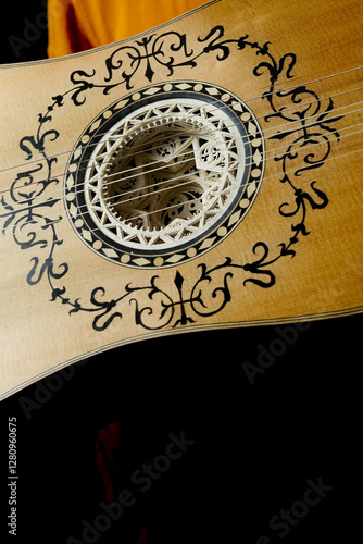 Wallpaper Mural Close up view of a baroque guitar isolated on black background Torontodigital.ca