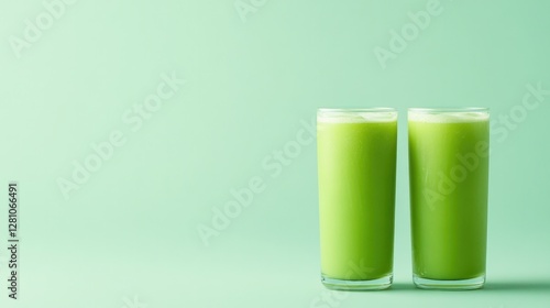 Wallpaper Mural Refreshing green smoothies in tall glasses on soft mint backgrou Torontodigital.ca