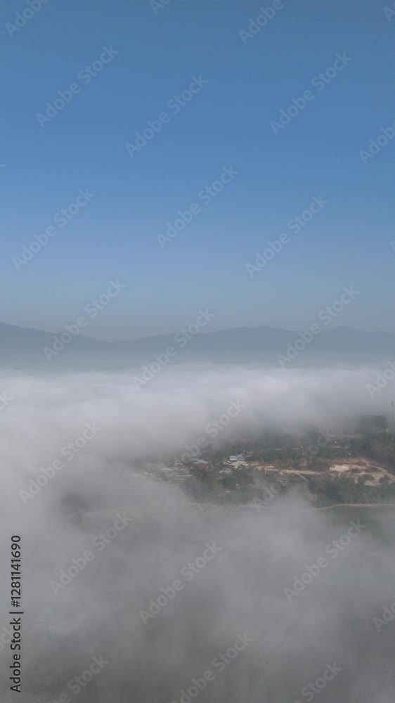 Clouds on high mountain peaks in the rainy season in the Asian rainforest. Clouds on high mountain peaks in the rainy season in the Asian rainforest.