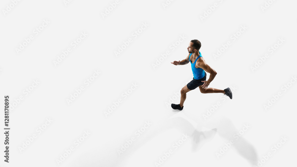Top view image of muscular, competitive man, runner in motion, running, training isolated on white studio background. Concept of sport, competition, endurance, athletics, sportive lifestyle. Ads Top view image of muscular, competitive man, runner in motion, running, training isolated on white studio background. Concept of sport, competition, endurance, athletics, sportive lifestyle. Ads