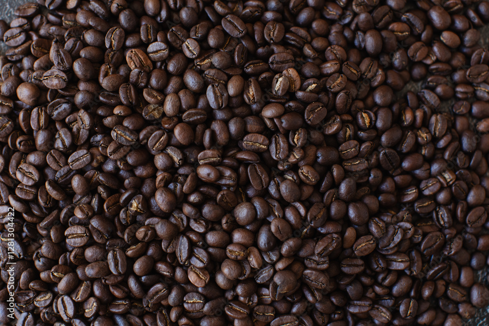 Roasted coffee beans brown seeds texture background wallpaper. Roasted coffee beans brown seeds texture background wallpaper.
