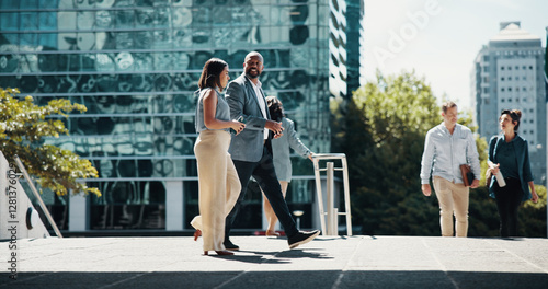 Business, employees and walking in city with discussion for corporate ideas, campaign planning and urban commute. Professional, people and morning journey to appointment, meeting or career conference