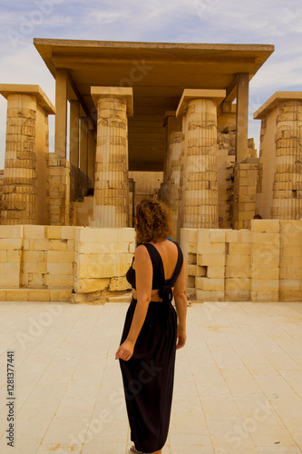 young woman in a black dress in sakkara in cairo, egypt