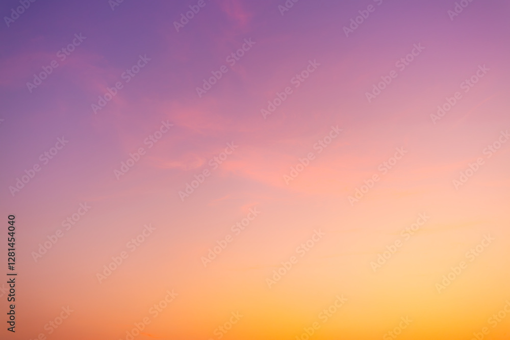 Obraz premium Clouds and pink sky backdrop,A beautiful sky tinted by the sun leaving vibrant shades of gold, pink, blue and multicolored. Clouds in the twilight evening and morning sky.