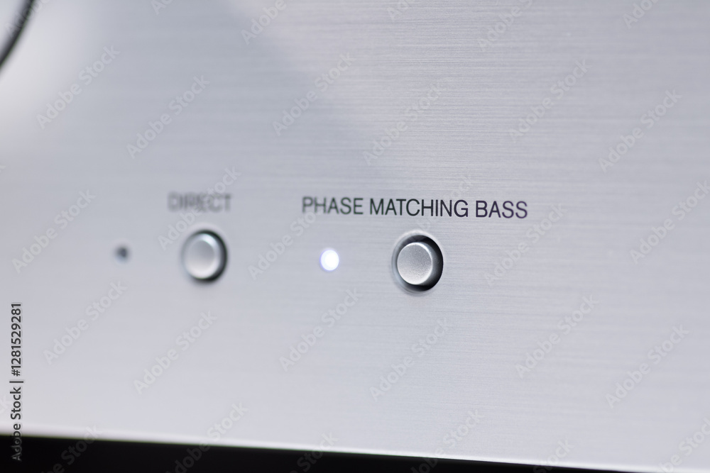 Close-Up of Audio Equipment with Phase Matching Bass Button Close-Up of Audio Equipment with Phase Matching Bass Button