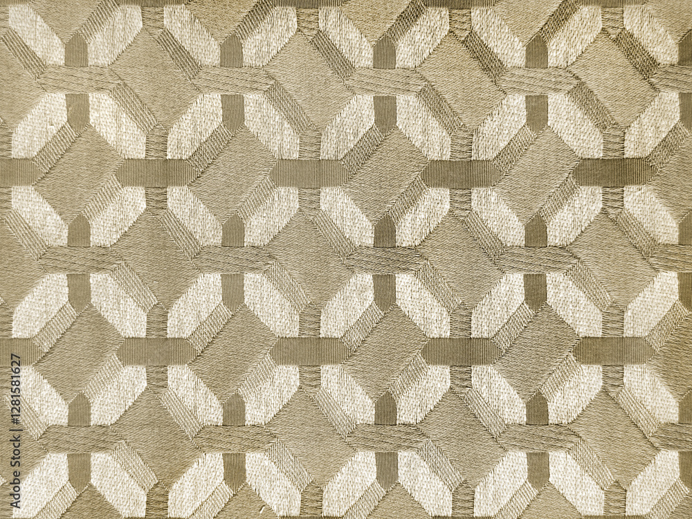 Close up of gold fabric in random geometric hexagon, diamond, and checkered pattern. Golden fabric in abstract modern geometrical texture. Seamless fabric background texture. Close up of gold fabric in random geometric hexagon, diamond, and checkered pattern. Golden fabric in abstract modern geometrical texture. Seamless fabric background texture.