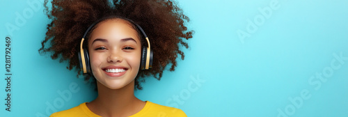 A cheerful girl with headphones, beaming a smile against a mint background, reflecting the concept of music enjoyment or learning in a light, positive, and modern setting, banner