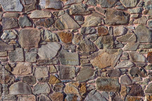 Obraz na płótnie Beautifully textured stone wall showcasing nature's artistry in a serene outdoor setting w salonie