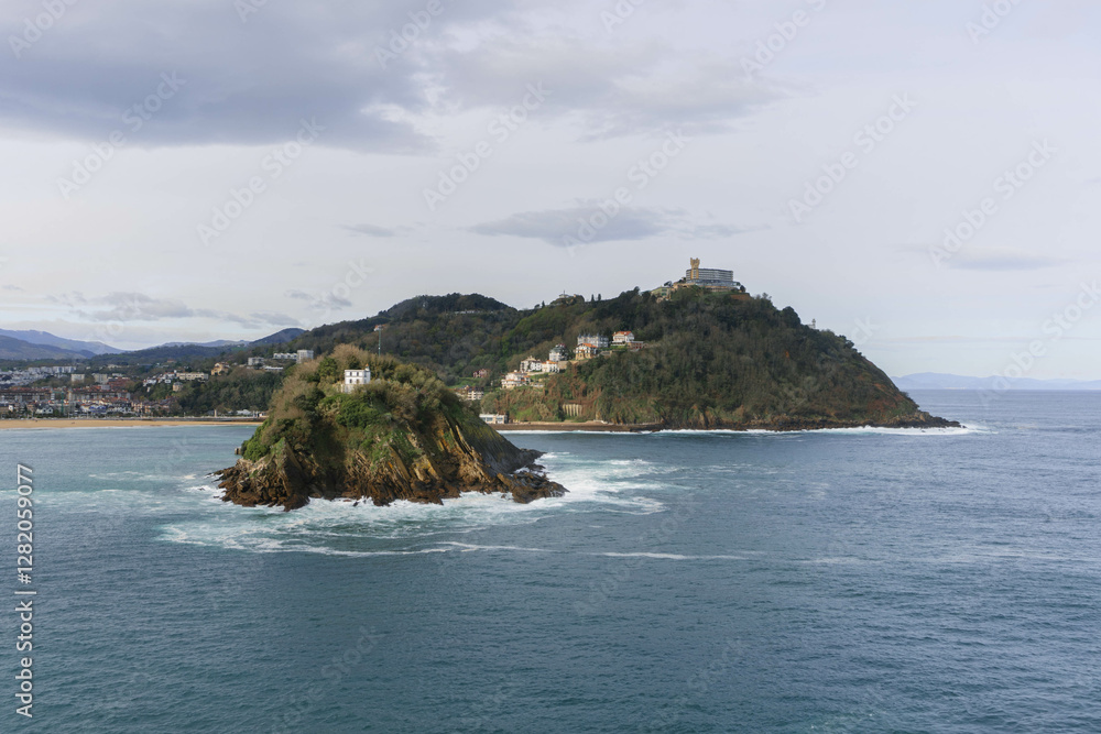 view from top of vizcaya bay in city with turtle shaped island in the middle in northern spain view from top of vizcaya bay in city with turtle shaped island in the middle in northern spain