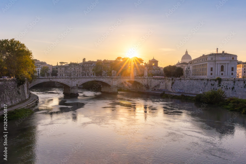 Naklejka premium Bridge crossing the Tiber River in Rome Italy at sunset