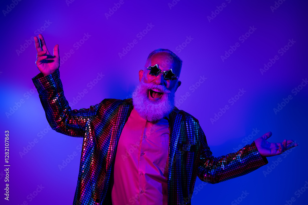 Fototapeta premium Photo of funky cool mature guy dressed glamour costume star eyewear dancing disco emtpy space isolated neon purple color background