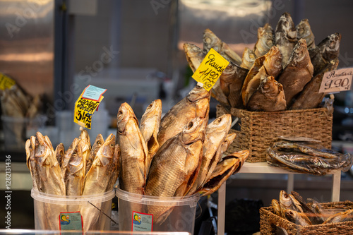 Foto Smoked fish at a traditional market stall at the Riga Central Market (Rigas Cent