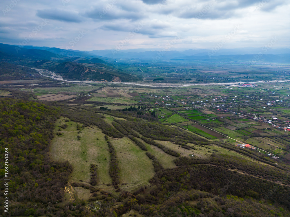 Obraz premium View of mountain valley and hills, aerial view, horizontal movement
