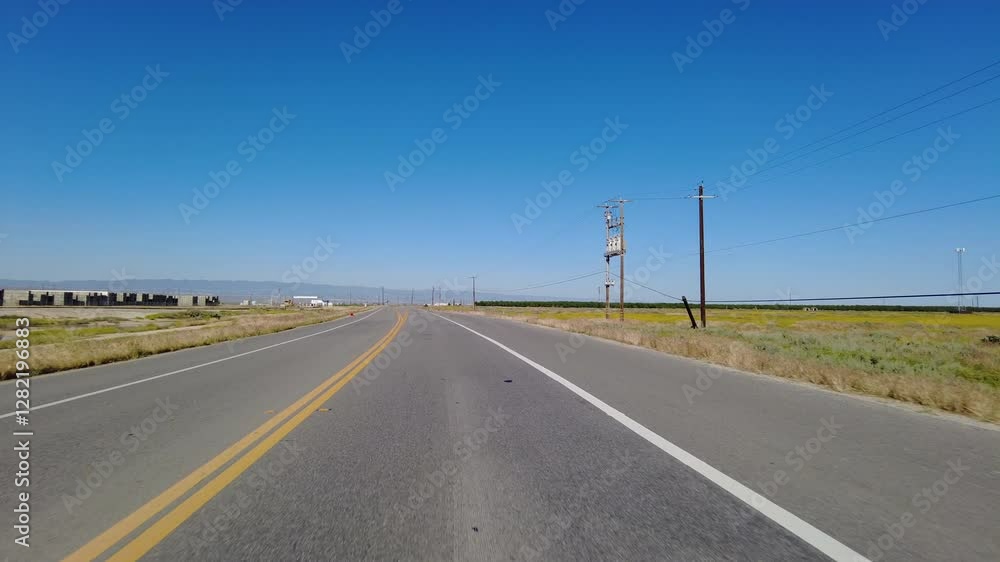 San Joaquin Valley Farmland Buttonwillow 01 Front View Driving Plates of Highway 58 West California USA San Joaquin Valley Farmland Buttonwillow 01 Front View Driving Plates of Highway 58 West California USA