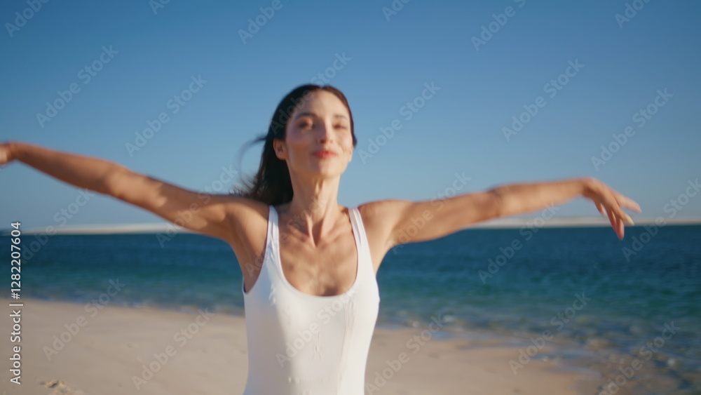 Joyful woman running shoreline enjoying summer vacation on resort closeup Joyful woman running shoreline enjoying summer vacation on resort closeup