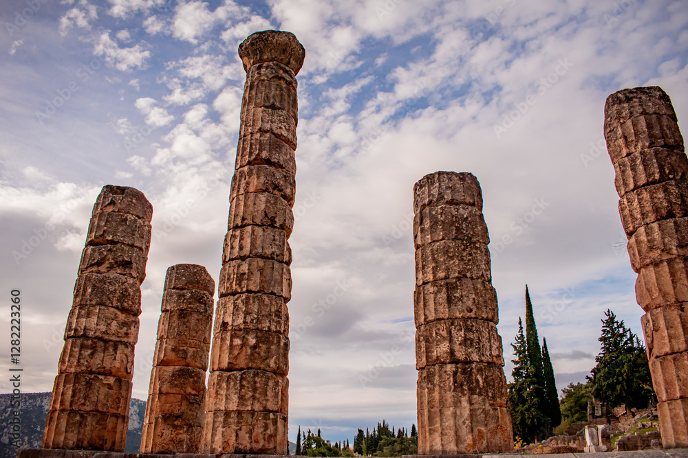 The columns that remain from the ancient temple in Delphi, on the steep lower slope of Mount Parnassus. The columns that remain from the ancient temple in Delphi, on the steep lower slope of Mount Parnassus.