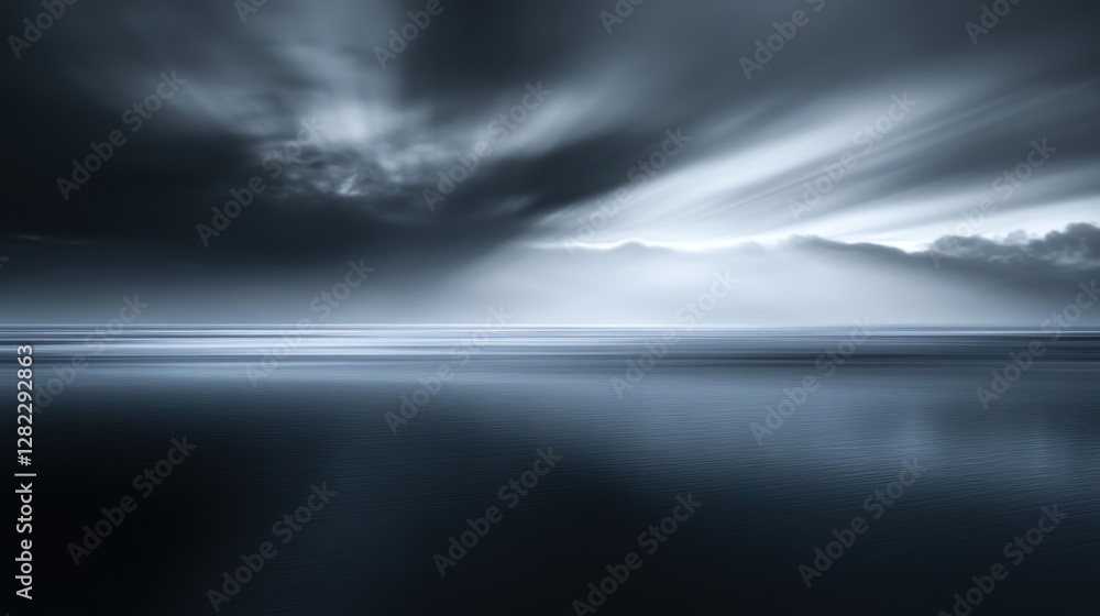 Obraz premium Dramatic Monochrome Beach Landscape With Radiating Light From Cloudy Sky