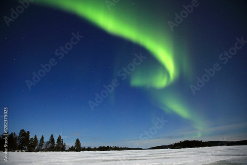 фотографія Aurora Borealis seen at lake Inari, Northern Finland