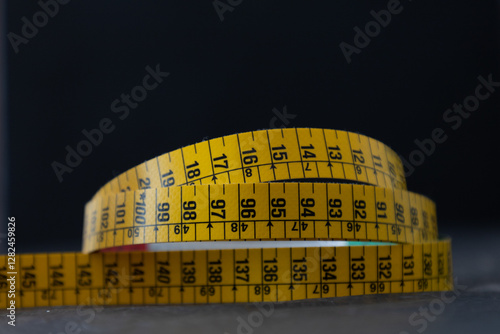 tape measure on a black background