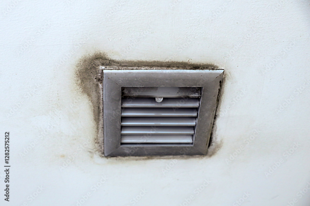 Water drop leak on air conditioner grille is ceiling stain and cracked and mold. Water drop leak on air conditioner grille is ceiling stain and cracked and mold.