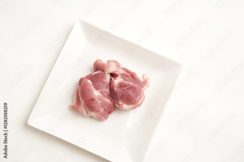 raw pork meat isolated on white background. Top view raw pork meat isolated on white background. Top view