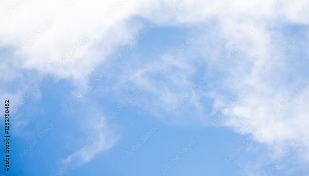 Sky background with clouds. White clouds against a blue sky. Sky background with clouds. White clouds against a blue sky.