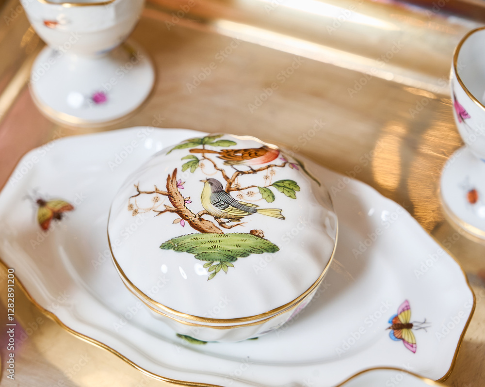Fine vintage Rothschild Bird porcelain for true connoisseurs and royalty. The finest hand-painted forforework. Magnificent setting using unique textiles and fresh flowers. This service will not leave